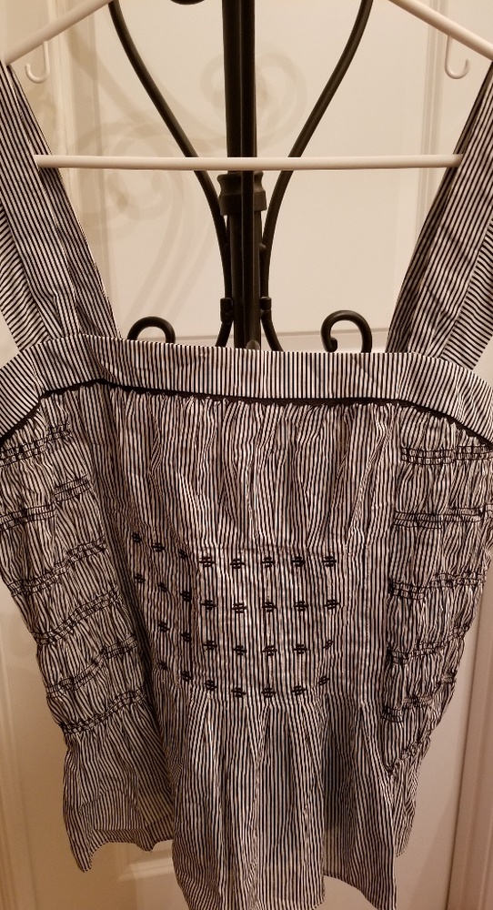 Navy blue and white striped, halter top.